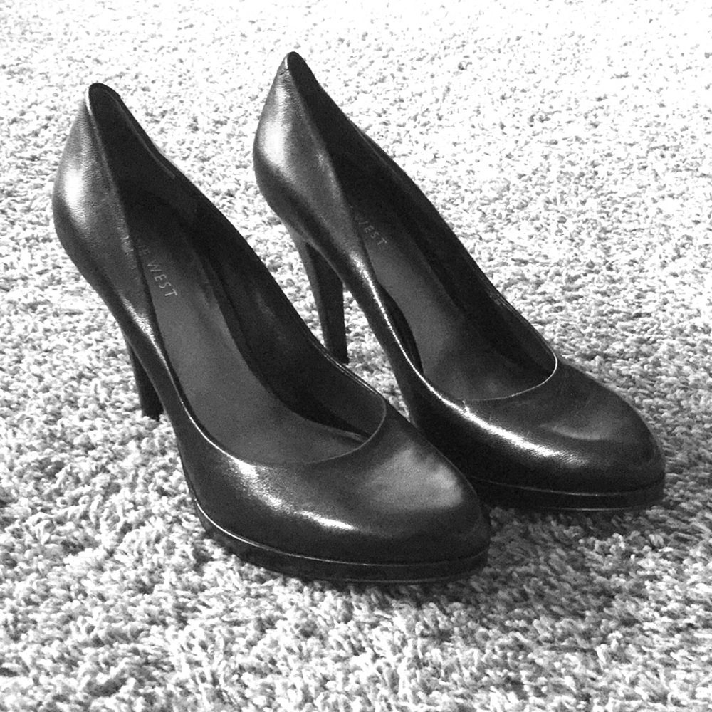 Black leather pumps